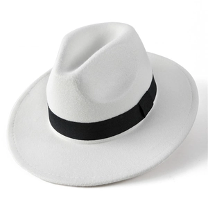 Detailed view of white felt fedora hat featuring a contrast black ribbon and fine stitching