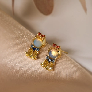 Exquisite 18K gold plated princess stud earring with colorful zircon on satin fabric