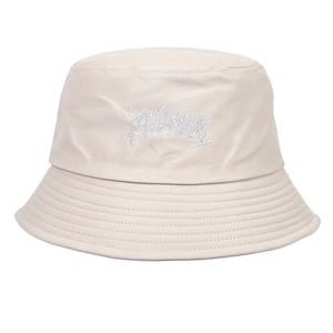 Detailed close-up of white Gothic embroidery on beige washed cotton bucket hat