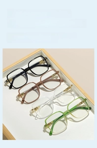 Detailed view of square spectacle frames featuring metallic hollow out temple design