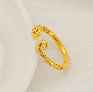 Detailed macro view of 18K gold-plated adjustable ring with retro cloud relief patterns