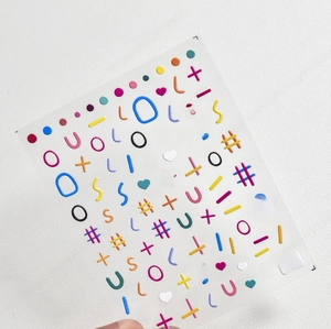 Detail of 3D embossed nail art stickers with colorful letters and cute lines, model to 605