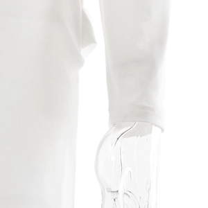 Close-up of the long sleeve cuff detail on a white slim-fit dress with smooth texture
