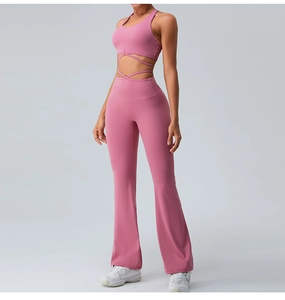 Pinkish purple yoga set featuring a cross-waist sports bra and flared high-waist pants