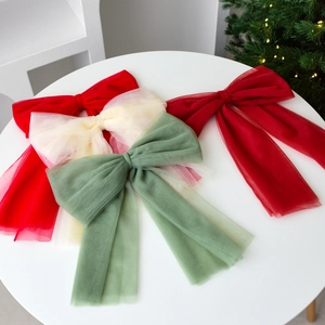 Large tulle bow ornaments for Christmas tree decor in red, cream, green and burgundy