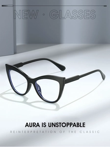 Detail shot of black cat-eye glasses frame at a 45-degree angle in a modern studio setting