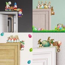 Detailed view of wooden Easter bunny and gnome ornaments placed on door corners