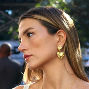 Golden double heart drop earrings for women made of polished stainless steel