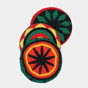 Three-piece Rastafarian knit beanie set with red yellow green stripes and leaf pattern
