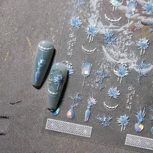 Macro view of M-446 blue Chinese style nail stickers with lotus and lantern motifs