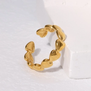 Minimalist gold heart-shaped open ring featuring multiple connected polished heart icons