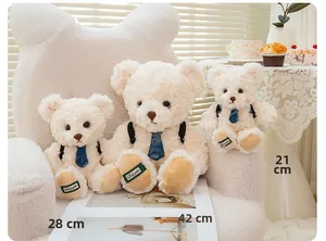 Three cream curly plush teddy bears with blue ties in sizes 21cm, 28cm, and 42cm