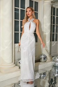 Close-up of white sequin evening gown featuring halter cutout and colorful gem neckline