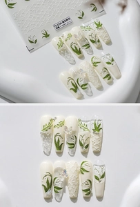 Detailed view of lily of the valley 5D embossed nail art stickers with pearl accents