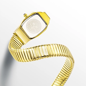 Detailed view of gold snake watch stainless steel back with water resistant engraving