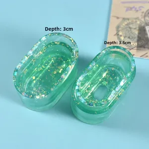 Macro view of green resin earring storage molds with 3cm and 3.5cm depth markers
