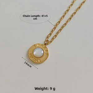 Detail of golden vintage coin pendant with white shell inlay, size 18mm, length 41+5cm