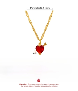Macro view of gold copper heart necklace with Cupid arrow and zircon detail parameters