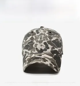Front view of washed camo baseball cap featuring gray woodland camouflage patterns
