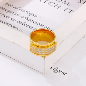 Detailed macro view of 18k gold plated ring with micro-pave cubic zirconia setting