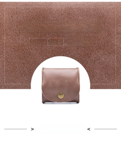 Close-up of soft split leather texture and flap snap closure on the mini coin pouch