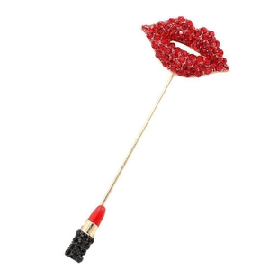 Fashionable red lips and lipstick brooch with crystals and tassel on gold long pin