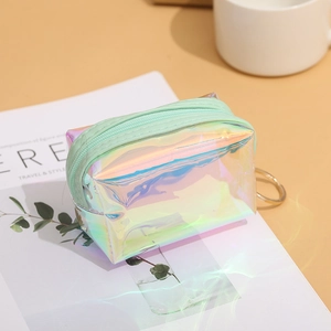 Close-up of holographic square coin purse with laser TPU texture and green zipper detail