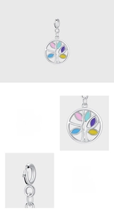 Macro detail of S925 sterling silver Tree of Life pendant with colorful enamel leaf accents
