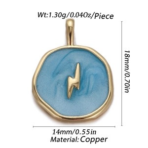 Detail view of round gold enamel charm with lightning bolt pattern and size dimensions