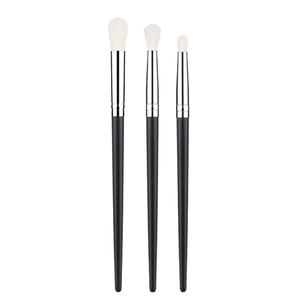 Set of 3 professional wool-like eye shadow brushes with matte black handles and silver ferrules