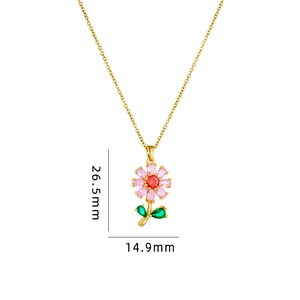 Minimalist flower pendant necklace with pink petals and gold chain for women