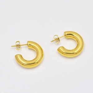 Minimalist gold hollow C-shaped hoop earrings with a high-polished mirror finish