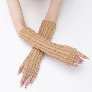 Detailed cable-knit pattern on camel colored arm warmers with fingerless design