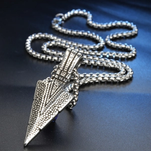 Polished silver stainless steel arrow pendant necklace with dot-textured surface