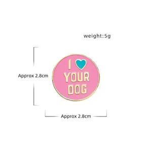 Round pink enamel brooch with gold I Heart Your Dog lettering and blue heart detail