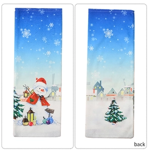 Detailed view showing the front and back of a snow-themed Christmas wine bottle cover