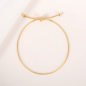 Minimalist 18K gold snake bone bracelet with adjustable slider clasp for women