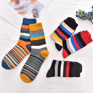 Classic colorful striped cotton crew socks for men in various bright geometric patterns