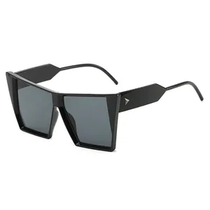 Retro oversized cat-eye sunglasses with square frame and silver triangle rivet details
