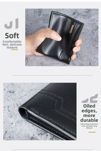 Macro detail of soft litchi texture leather wallet with durable oil edges and stitching