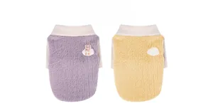 Detail of purple and yellow pet fleece vests with cute teddy bear embroidery patches
