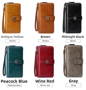 Matrix display of women's vintage long RFID wallets in six colors with leather wrist straps