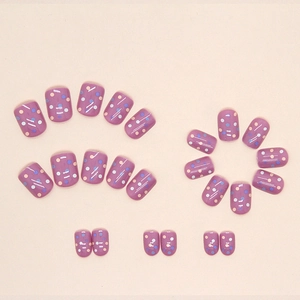 Glossy purple polka dot press-on nails with colorful wave line textures in various sizes