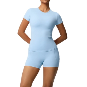 Light blue two-piece yoga set with slim fit short sleeve t-shirt and high waist shorts