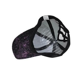 Detail view of cotton-polyester cap interior with wash label and breathable mesh back