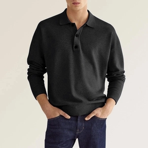 Detail of grey men's long sleeve polo shirt showing v-neck buttons and knitted texture