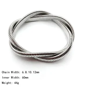 Detailed close-up of a silver stainless steel spiral snake chain bangle with 8mm width