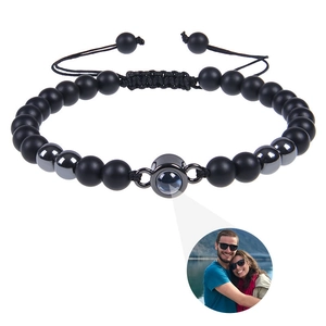 Custom photo projection bracelet with matte tiger eye beads and adjustable black cord