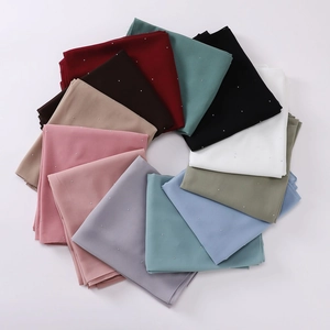 Multi-colored pearl chiffon scarves with rhinestone accents displayed in a circular layout