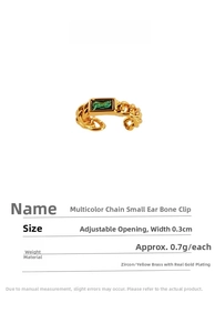 Detail of gold chain ear cuff with a rectangular green zircon inlay for non-pierced ears